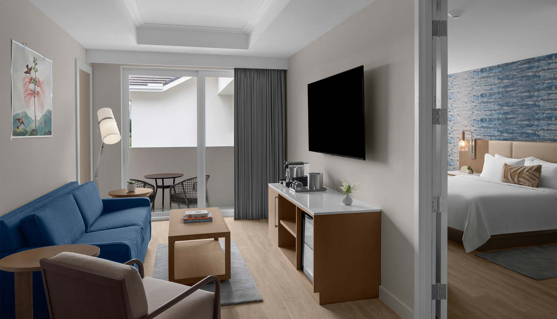 The Belgrove Guestroom King Suite With Sofa Bed Living Area With Walled Balcony